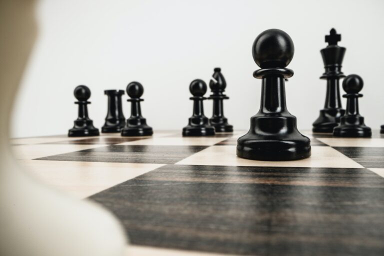 Macro photo of chess pieces on a chess board